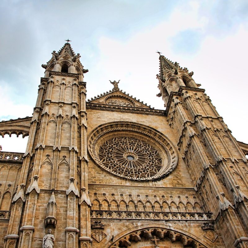 Gothic rose window of Palma de Mallorca Cathedral, showcasing the architecture and design of the city