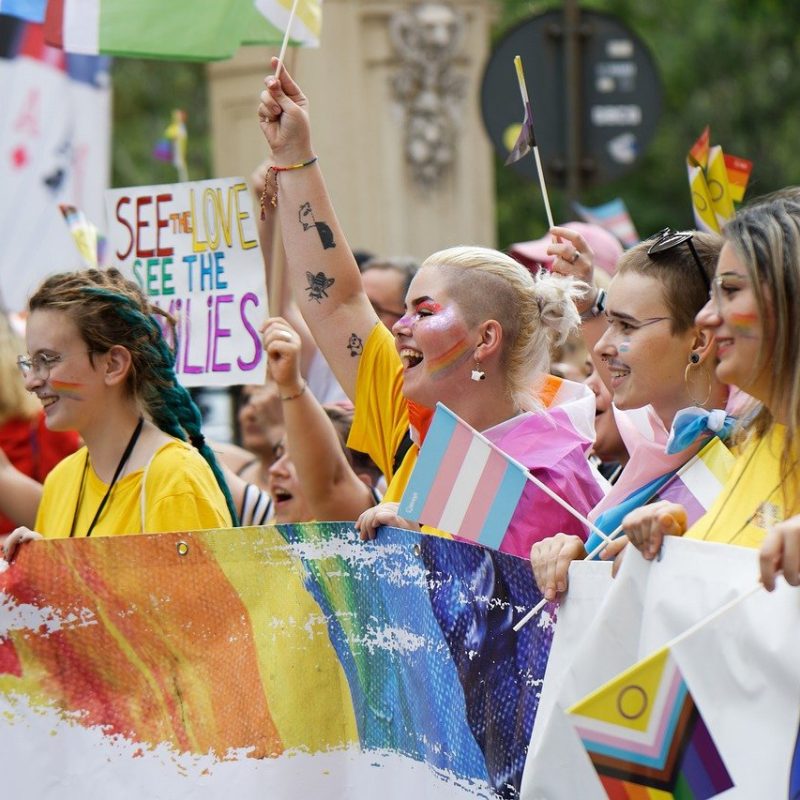 Group of girls demonstrating for LGBTQ+ rights in the streets of Madrid