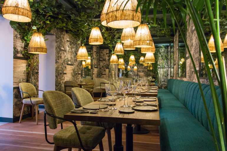 Interior of Caruana restaurant, featuring its unique setting in a former chapel with elegant décor