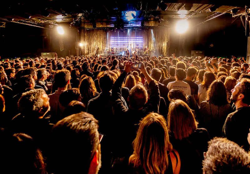 People enjoying a concert at Sala Riviera in Madrid