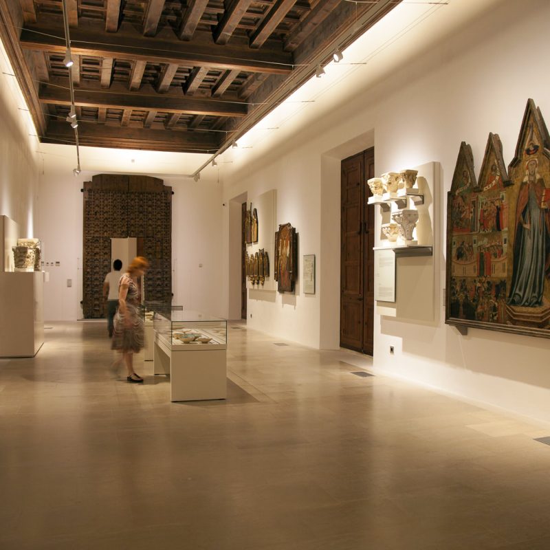 Interior of a museum in Palma de Mallorca featuring art exhibits