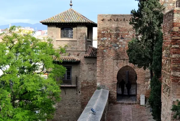 Section of the outer wall with an arched entrance gate at the Alcazaba of Málaga